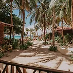 Petit Lafitte Beach Front Hotel & Bungalows