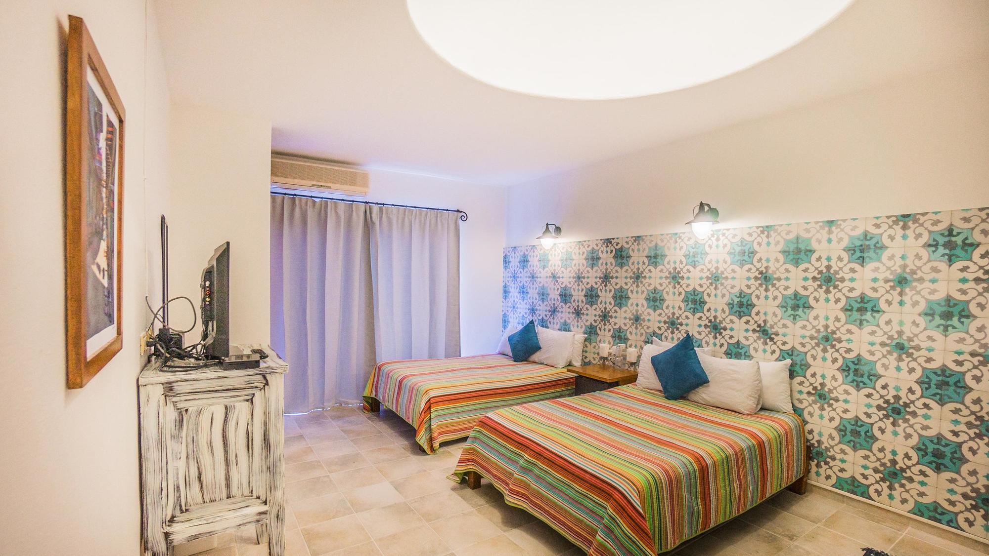 Bric Y Playa del Carmen